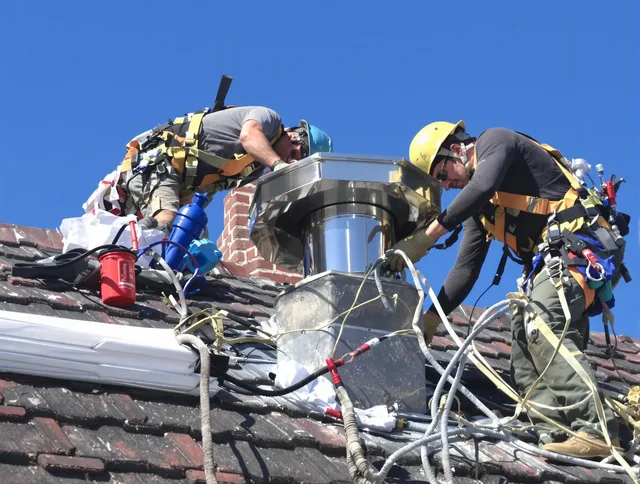 Protective chimney cap installed by Dartmouth Chimney Sweep in Dartmouth, MA