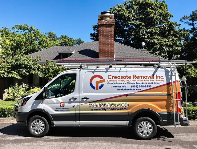 Dartmouth Chimney Sweep technician removing creosote safely in Dartmouth, MA